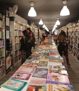 The inside of reread. Books everywhere and people shopping for something new