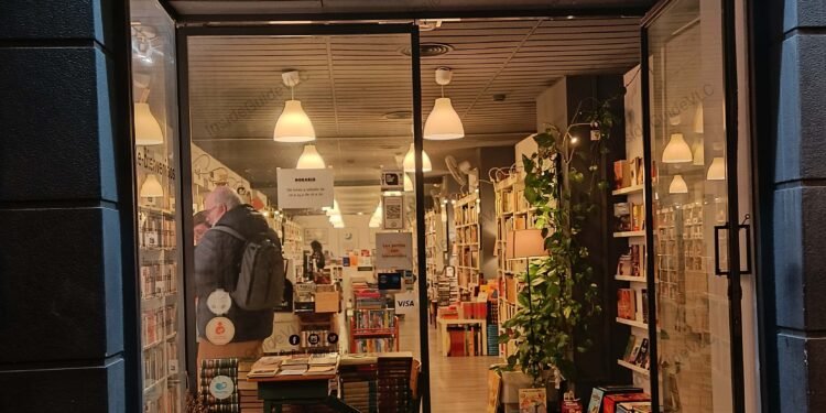 The outside of re-read at night. Lights inviting us in.