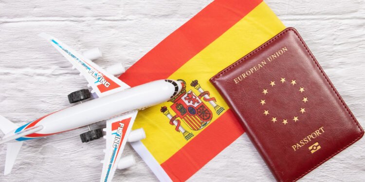 Passport and Flag of Spain